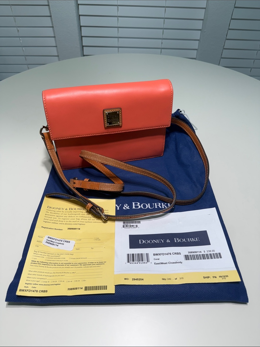 Dooney & Bourke Coral Leather East/Weat Crossbody with Tan Strap